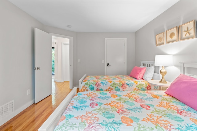 bedroom featuring light hardwood / wood-style flooring