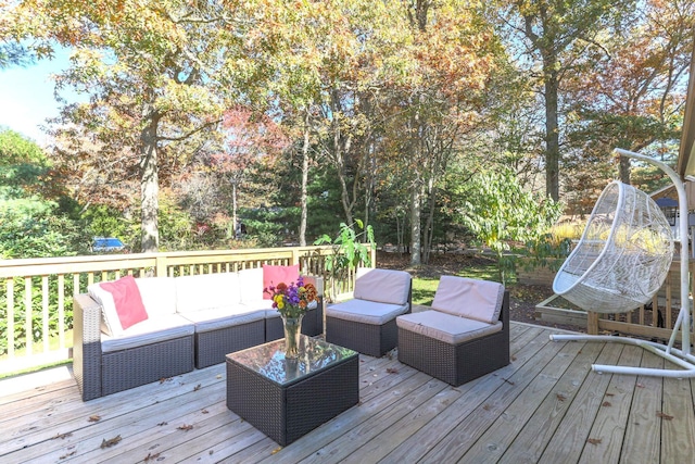 wooden terrace featuring an outdoor living space