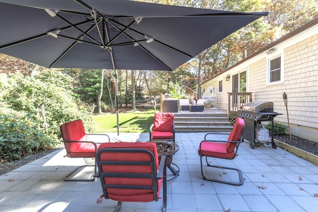 view of patio / terrace with an outdoor living space and area for grilling