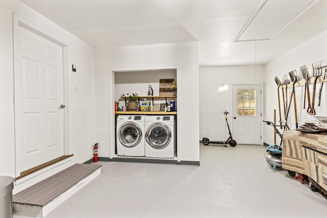 laundry area featuring washer and clothes dryer