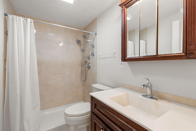 6 Harrington Way, Hyannis, MA 02601 - bathroom featuring toilet, tiled shower, and vanity