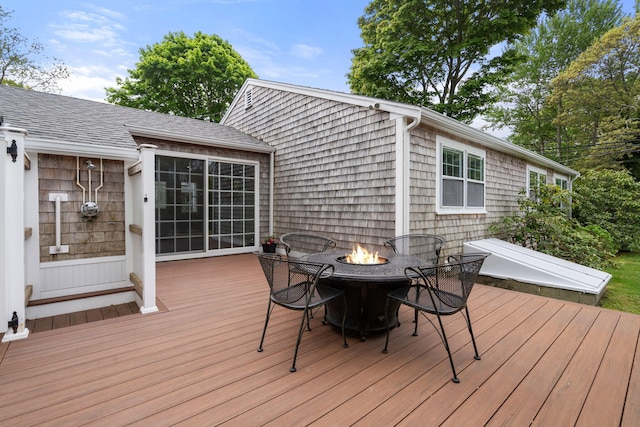 6 Harrington Way, Hyannis, MA 02601 - wooden deck featuring a fire pit