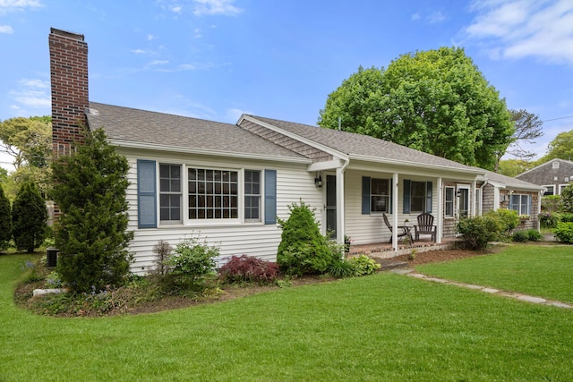 6 Harrington Way, Hyannis, MA 02601 - single story home featuring covered porch, a front yard, a chimney, and roof with shingles