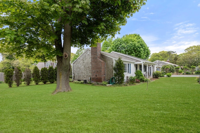 6 Harrington Way, Hyannis, MA 02601 - view of property exterior featuring a chimney and a yard