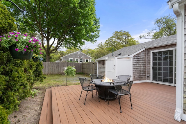 6 Harrington Way, Hyannis, MA 02601 - wooden terrace featuring a fenced backyard and an outdoor fire pit