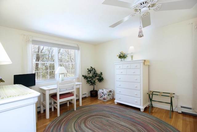 19 Featherbed Ln, Brewster, MA 02631 - bedroom featuring wood finished floors, an office area, and a ceiling fan