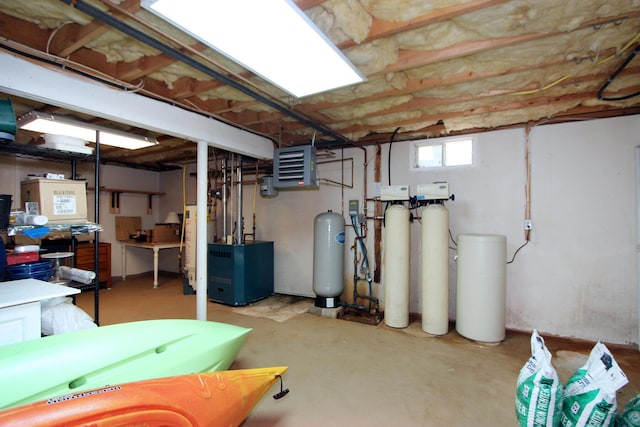 19 Featherbed Ln, Brewster, MA 02631 - basement featuring a water softener system, a heating unit, and a water pressure tank