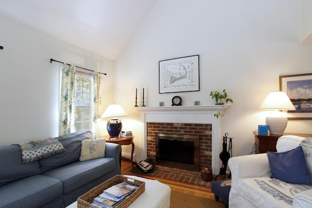 19 Featherbed Ln, Brewster, MA 02631 - living room with a brick fireplace and high vaulted ceiling