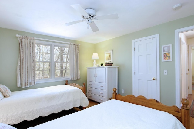 19 Featherbed Ln, Brewster, MA 02631 - bedroom featuring ceiling fan and wood finished floors