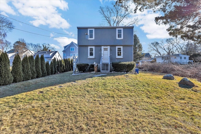 front facade with a front lawn