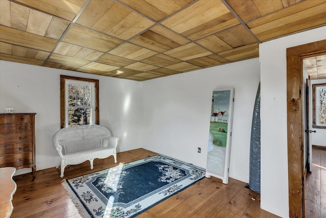 sitting room with hardwood / wood-style floors