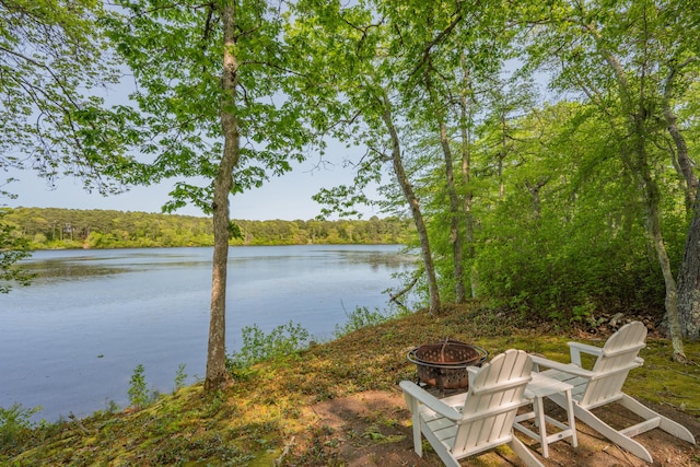 23 Walkerwoods Dr, Harwich, MA 02645 - water view with a fire pit and a heavily wooded area