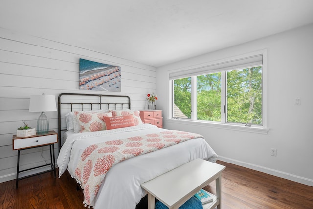 23 Walkerwoods Dr, Harwich, MA 02645 - bedroom featuring wood finished floors and wooden walls