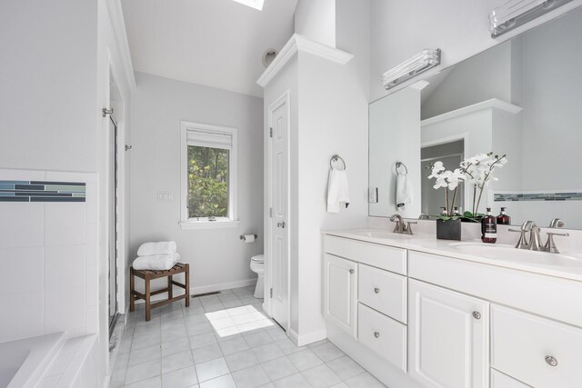 23 Walkerwoods Dr, Harwich, MA 02645 - full bathroom featuring double vanity, a tub to relax in, tile patterned flooring, and a shower