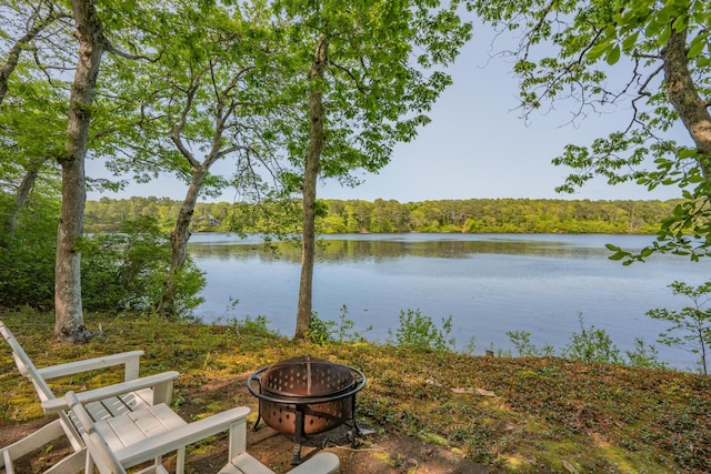 23 Walkerwoods Dr, Harwich, MA 02645 - water view with an outdoor fire pit and a forest