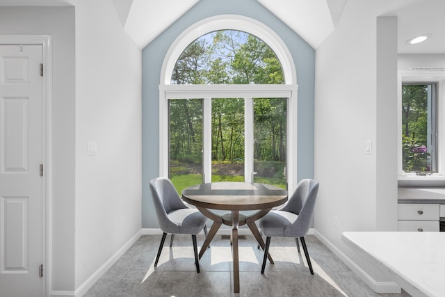 23 Walkerwoods Dr, Harwich, MA 02645 - dining room with lofted ceiling and baseboards