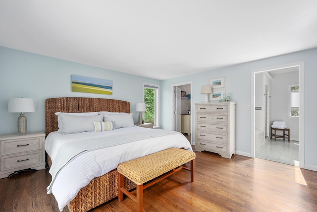23 Walkerwoods Dr, Harwich, MA 02645 - bedroom featuring wood finished floors, a walk in closet, and a closet