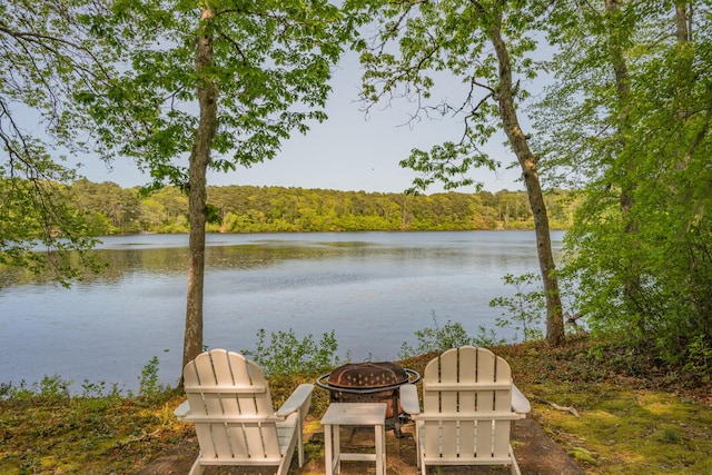 23 Walkerwoods Dr, Harwich, MA 02645 - water view featuring a heavily wooded area and a fire pit