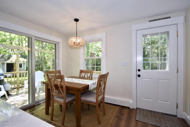 4 Spinnaker Ln, Pocasset, MA 02559 - dining space with a baseboard heating unit, a chandelier, and healthy amount of natural light