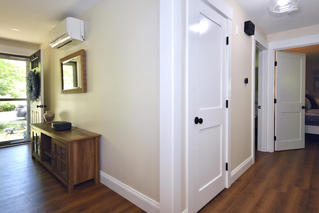 4 Spinnaker Ln, Pocasset, MA 02559 - hallway featuring dark wood finished floors, baseboards, and an AC wall unit