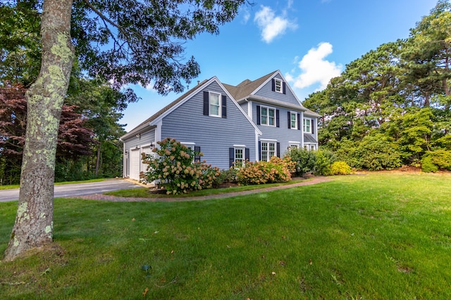 24 Longshank Cir, Hatchville, MA 02536 - view of front of property with driveway, a front lawn, and an attached garage