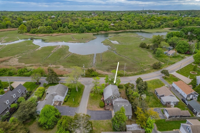 7 George St, Barnstable, MA 02630 - aerial overview of property's location with a large body of water, nearby suburban area, and a forest
