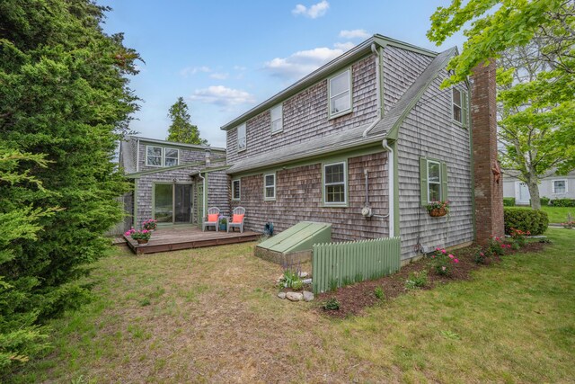 7 George St, Barnstable, MA 02630 - back of house featuring a deck, a yard, and a chimney