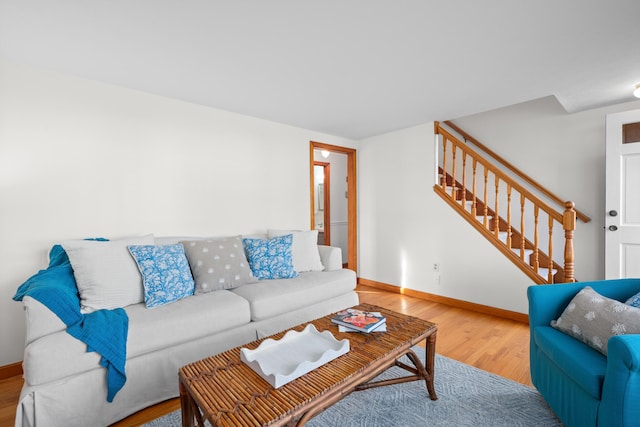 7 George St, Barnstable, MA 02630 - living room featuring wood finished floors, stairway, and baseboards