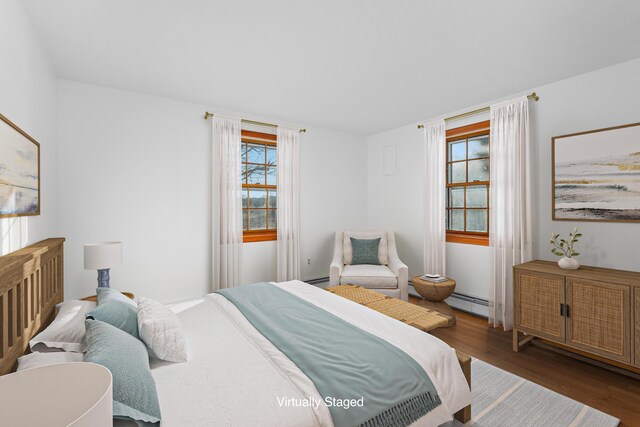7 George St, Barnstable, MA 02630 - empty room with baseboard heating and light wood-style flooring
