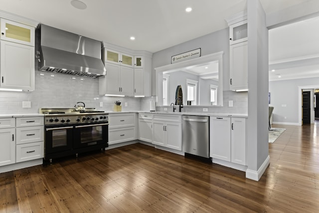 48 Red Brook Harbor Rd, Cataumet, MA 02534 - kitchen featuring wall chimney range hood, dishwasher, range with two ovens, light countertops, and decorative backsplash