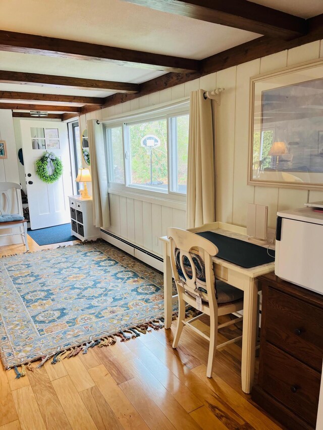 29 Chipman Rd, Sandwich, MA 02563 - dining space with light wood finished floors, baseboard heating, and beam ceiling