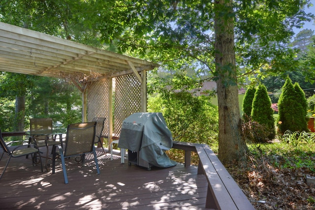 59 Whitecaps Dr, East Falmouth, MA 02536 - wooden deck featuring a grill and outdoor dining space