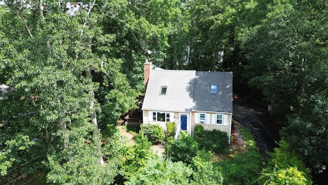 59 Whitecaps Dr, East Falmouth, MA 02536 - view of front of property with a chimney and a shingled roof