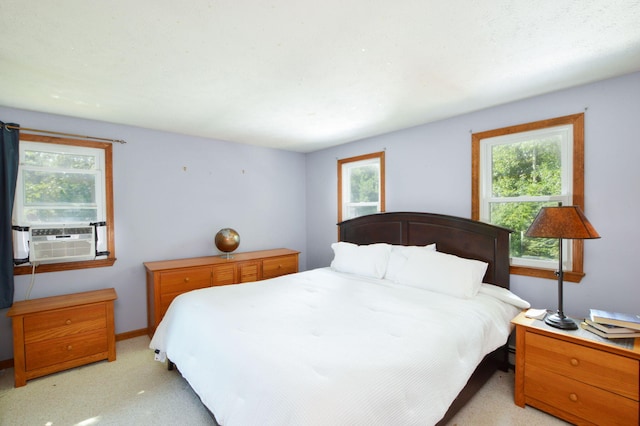 59 Whitecaps Dr, East Falmouth, MA 02536 - bedroom featuring cooling unit, multiple windows, and light carpet