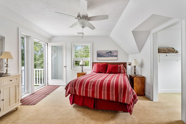 bedroom with baseboards, light colored carpet, ceiling fan, access to exterior, and vaulted ceiling