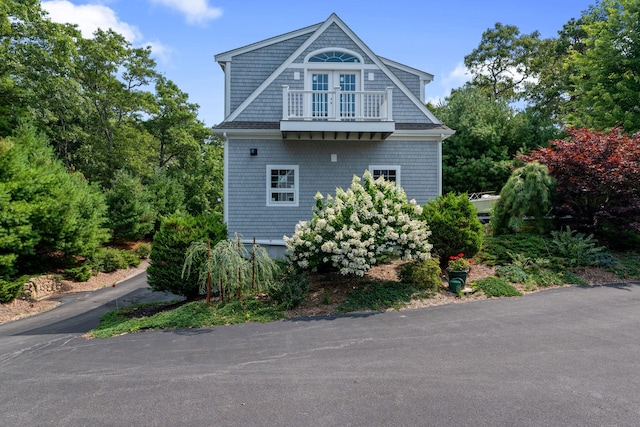 view of property exterior featuring a balcony