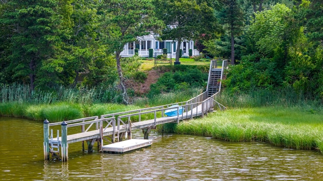 view of dock with a water view