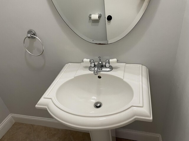 bathroom featuring sink and tile patterned flooring