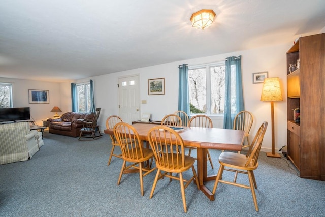 view of carpeted dining space