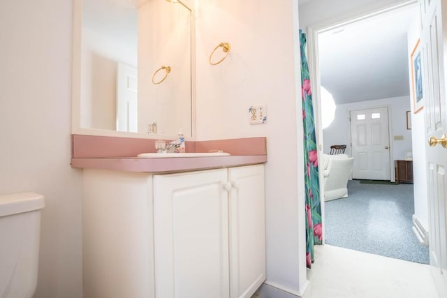 bathroom with vanity and toilet