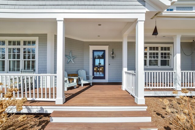 entrance to property with covered porch