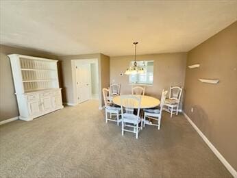 6 Sea Cliff Dr E Unit 6, Cedarville, MA 02360 - dining area featuring carpet floors and a chandelier