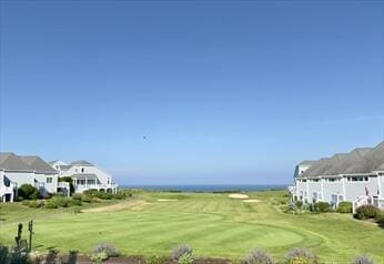 6 Sea Cliff Dr E Unit 6, Cedarville, MA 02360 - view of property's community with golf course view and a lawn