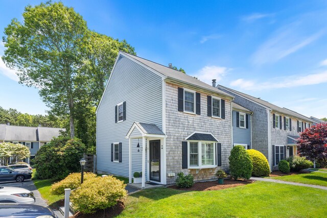 441 Buck Island Rd Unit B1, West Yarmouth, MA 02673 - view of front of house with a front yard