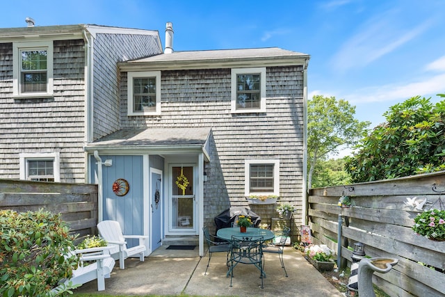 441 Buck Island Rd Unit B1, West Yarmouth, MA 02673 - rear view of property featuring a patio area and a fenced backyard