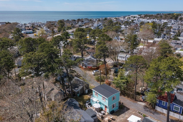 aerial view with a water view and a residential view