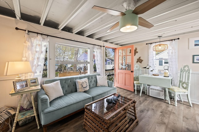 living area with ceiling fan and wood finished floors