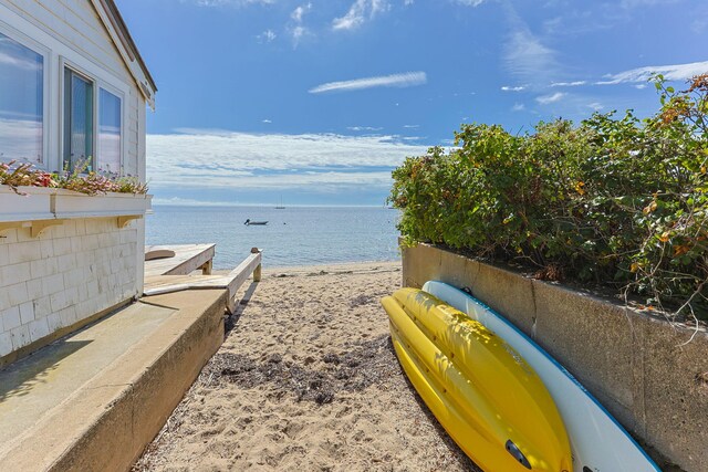 property view of water featuring a beach view