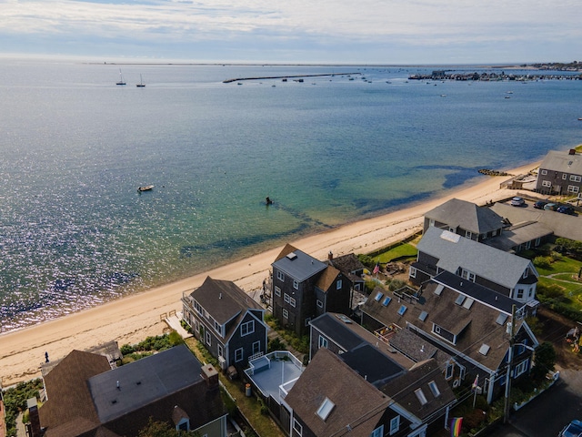 bird's eye view with a beach view and a water view