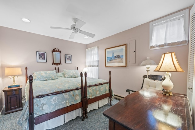 bedroom featuring ceiling fan, a baseboard radiator, and carpet floors